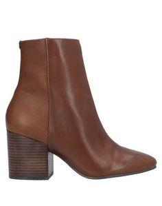 Полусапоги и высокие ботинки Guess