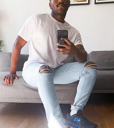Голубые джинсы скинни с рваными коленями ASOS DESIGN-Синий