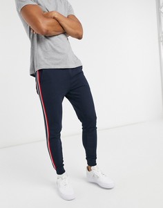 Темно-синие облегающие джоггеры с полосками по бокам ASOS DESIGN-Темно-синий