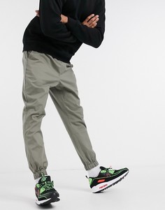 Зауженные джоггеры чиносы цвета хаки ASOS DESIGN-Зеленый