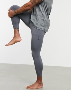 Серые леггинсы Nike Yoga-Серый