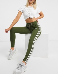 Зеленые леггинсы с тремя полосками и шнурком adidas Originals adicolor-Зеленый