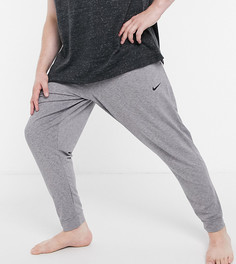 Серые джоггеры Nike Yoga Plus-Серый