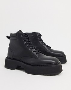 Черные блестящие кожаные ботинки на массивной подошве ASOS DESIGN-Черный
