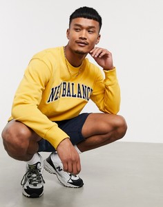Желтый свитшот New Balance Athletics