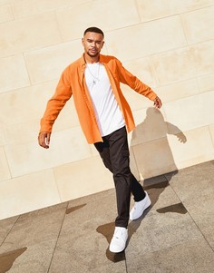 Вельветовая oversized-рубашка горчичного цвета в стиле 90-х ASOS DESIGN-Желтый