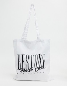 Белая сумка для покупок с принтом "restore health club" ASOS DESIGN-Белый