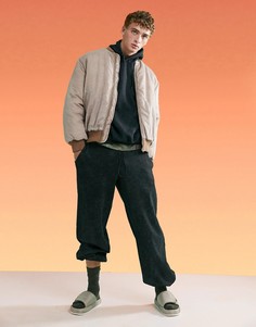 Спортивные брюки oversized с эффектом кислотной стирки ASOS 4505-Серый