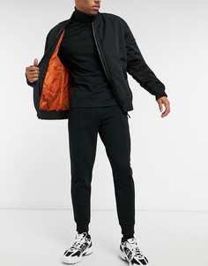 Черные зауженные джоггеры с прошитой стрелкой ASOS DESIGN-Черный