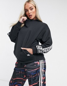 Черный свитшот с фирменной лентой adidas Training