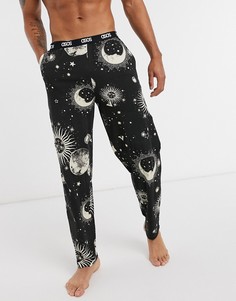 Пижамные штаны с космическим принтом ASOS DESIGN-Черный