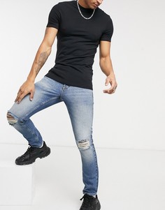 Узкие джинсы выбеленного синего цвета в винтажном стиле с рваной отделкой ASOS DESIGN-Синий