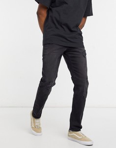 Черные узкие джинсы с рваной отделкой ASOS DESIGN-Черный