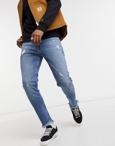 Темно-синие джинсы скинни в винтажном стиле с рваной отделкой и необработанным нижним краем ASOS DESIGN-Синий