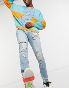 Светло-голубые выбеленные джинсы скинни с рваной отделкой ASOS DESIGN-Синий