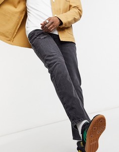 Зауженные черные выбеленные джинсы slim с эффектом потертости ASOS DESIGN-Черный