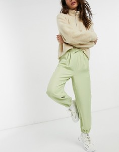 Спортивные брюки в стиле oversized светло-зеленого цвета от костюма ASOS DESIGN-Зеленый