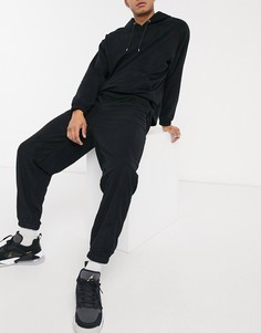 Черные свободные джоггеры в стиле oversized из плотного флиса от комплекта ASOS DESIGN-Черный