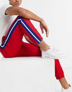 Красные джоггеры с полосками по бокам Lacoste-Красный