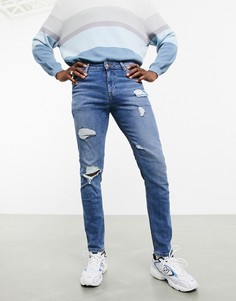Выбеленные рваные джинсы скинни из коллекции экологичной моды ASOS DESIGN-Синий