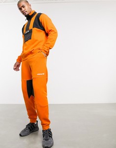 Оранжевые флисовые джоггеры adidas Originals adventure-Оранжевый