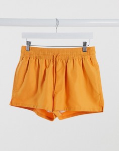 Оранжевые короткие шорты для плавания ASOS DESIGN-Оранжевый