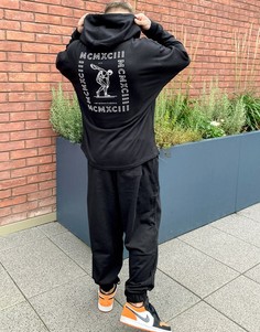 Спортивный костюм в стиле oversized с большим принтом на спине ASOS DESIGN-Черный
