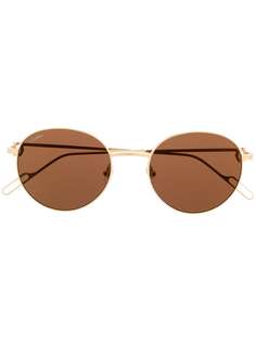 Cartier Eyewear солнцезащитные очки в круглой оправе