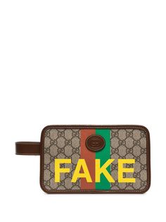 Gucci несессер с монограммой и принтом Fake/Not