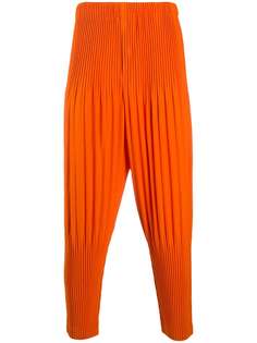 Homme Plissé Issey Miyake pleated tapered trousers