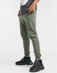 Зеленые джоггеры скинни ASOS DESIGN-Зеленый