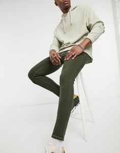 Темно-зеленые эластичные джинсы с напылением ASOS DESIGN-Зеленый