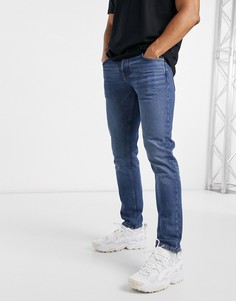 Темно-синие узкие джинсы из органического хлопка ASOS DESIGN-Синий