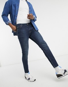 Темно-синие джинсы скинни в винтажном стиле с необработанной кромкой ASOS DESIGN-Синий