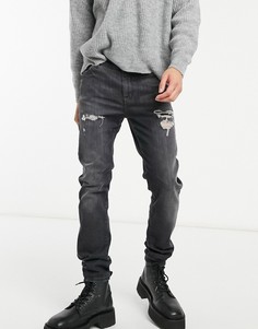 Облегающие джинсы из ткани плотностью 12,5 унции выбеленного черного цвета в винтажном стиле с потертостями ASOS DESIGN-Черный