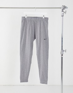 Серые джоггеры Nike Yoga-Серый