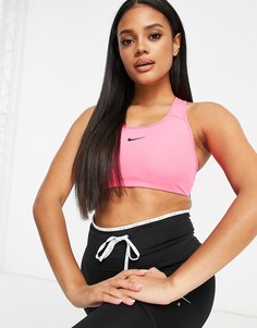 Розовый бюстгальтер с мягкими чашечками и логотипом Nike Training