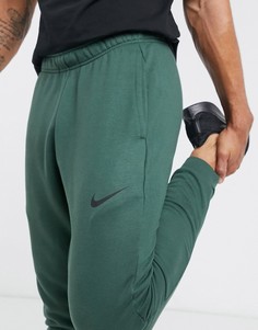 Суженные книзу флисовые джоггеры цвета хаки Nike Running-Зеленый