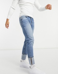 Узкие эластичные джинсы с отворотами выбеленного голубого цвета ASOS DESIGN-Голубой