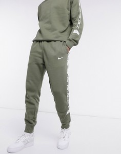 Джоггеры цвета хаки с манжетами и логотипом Nike Repeat Pack-Зеленый