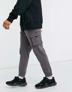 Брюки карго с вышивкой черного выбеленного цвета ASOS DESIGN-Черный
