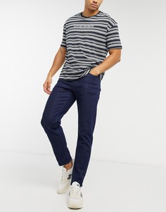 Суженные книзу джинсы цвета индиго ASOS DESIGN-Голубой