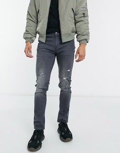 Серые зауженные джинсы с потертостями ASOS DESIGN-Серый