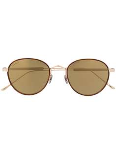 Cartier Eyewear солнцезащитные очки в круглой оправе