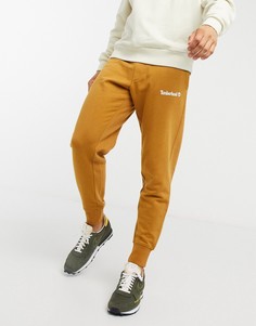 Бежевые спортивные брюки Timberland Established 1973-Коричневый