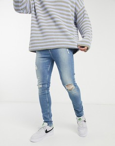 Светлые супероблегающие джинсы с рваными коленями ASOS DESIGN-Голубой
