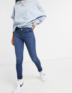 Светло-синие выбеленные супероблегающие джинсы Levis 710-Синий Levis®