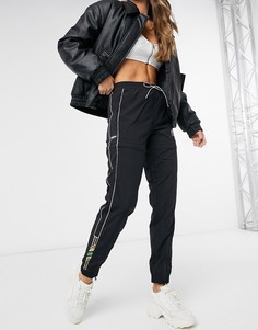 Черные спортивные брюки с молниями Puma-Черный