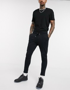 Черные суженные книзу джоггеры из органического хлопка с защипами ASOS DESIGN-Черный