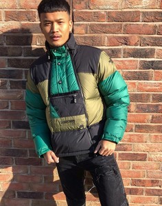 Зеленый пуховик The North Face Steep Tech